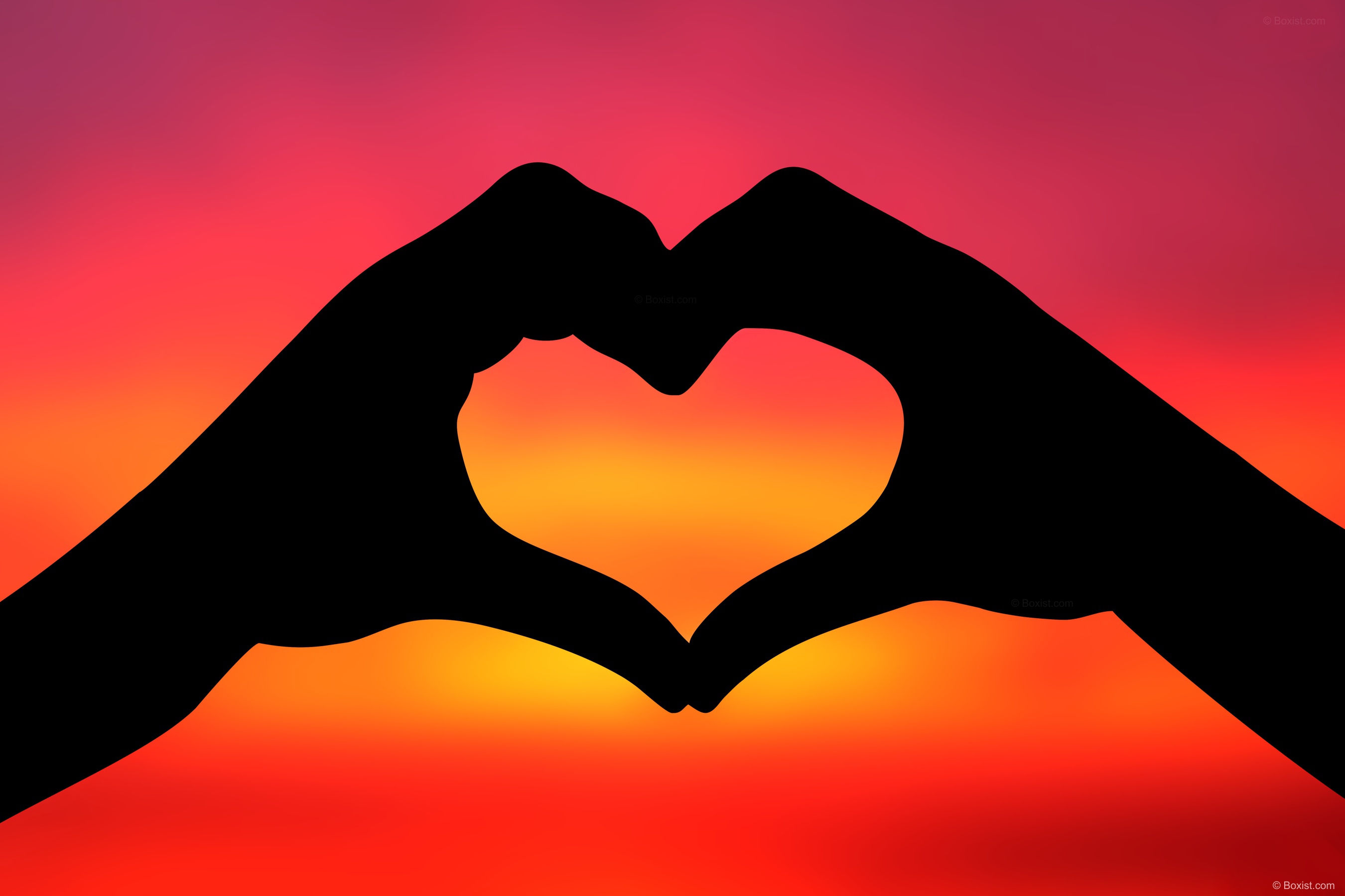 Silhouette-of-Love-Heart-Shape-with-Two-Hands-at-Sunset-Photos5-com